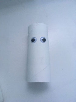 Glue the eyes to the roll.