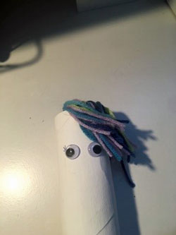 Use yarn to make the hair for your unicorn.