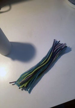 Use yarn to make the hair for your unicorn.