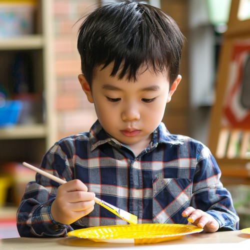 paint the paper plate yellow