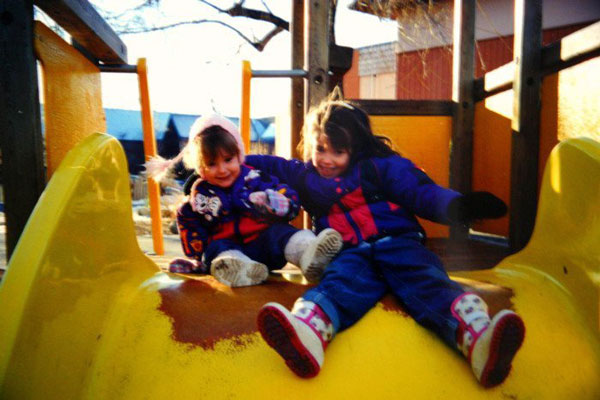 Tasha and Kaitlyn on a Slide.