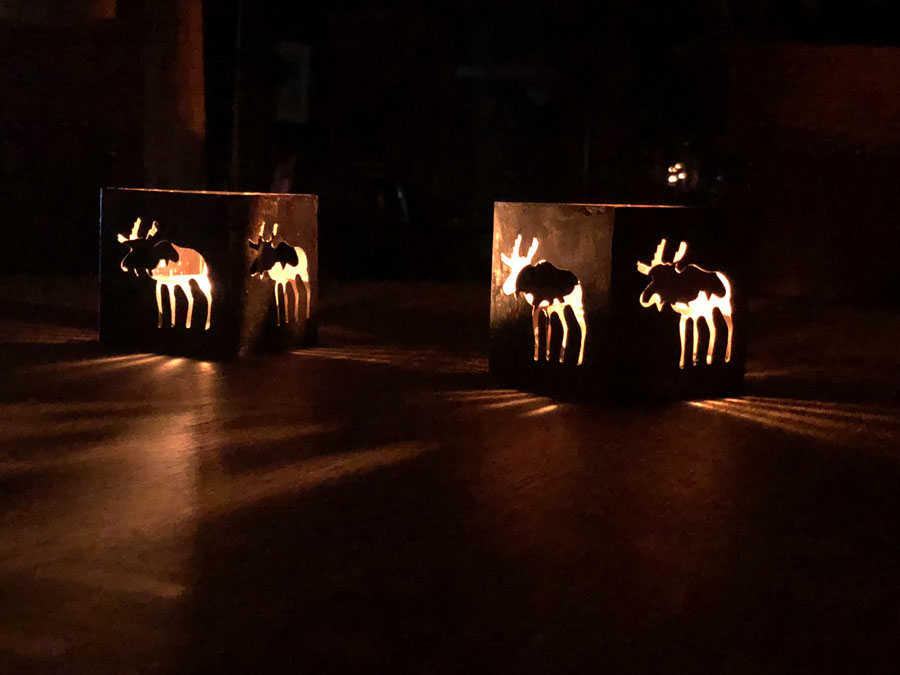 Moose candle holders lighting up the dining room at Num Ti Jah during a power outage.