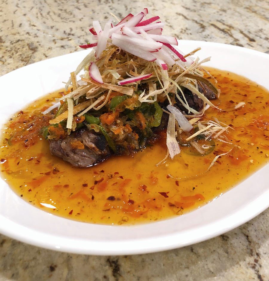 Ginger beef starter created by executive chef James Waters at Klein / Harris in Calgary, Canada