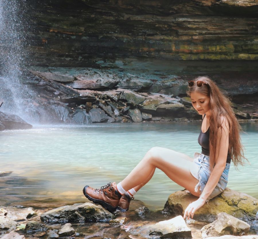 sitting at the upper falls of chedoke radial trail