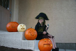 Carved Pumpkins and Pirate Costume