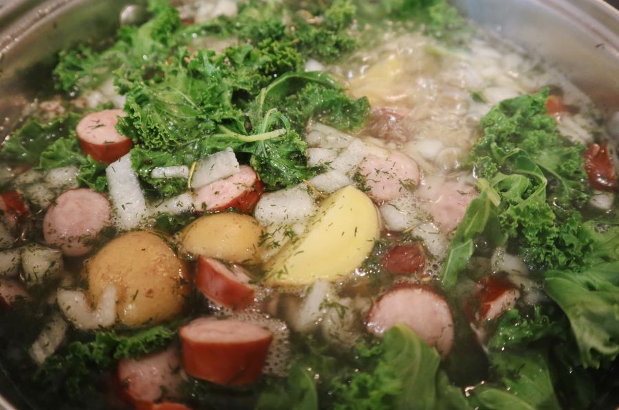 bringing ingredients for zummaborscht (or summer soup) to a boil