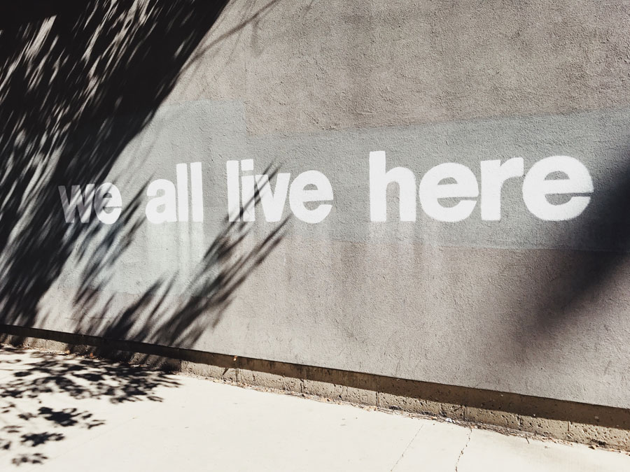 We All Live Here Quote