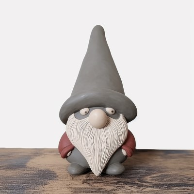 clay gnome with hands in pockets