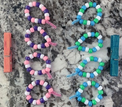 fold pipecleaners into wing shapes