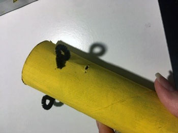 Work on the paper towel roll.
